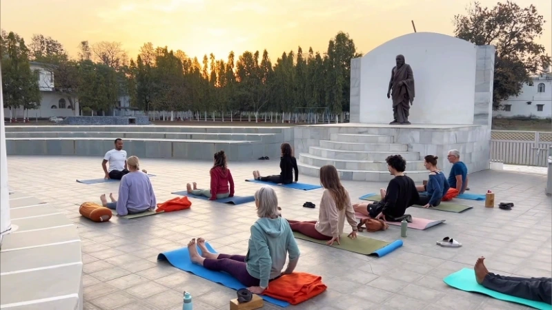 Morning yoga practice with meditation at Himalayan retreat by Atharv Yogshala