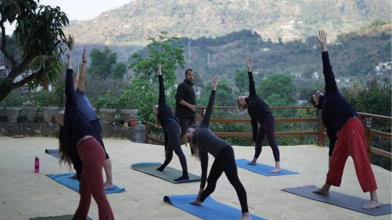 Yoga and pranayama breathing exercises session at Atharv Yogshala