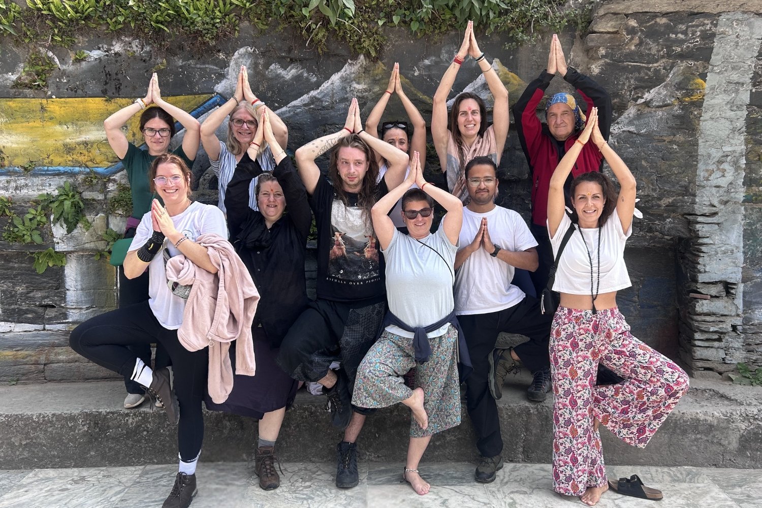 Group photo relaxing during 200 Hour Himalayan Hiking Yoga TTC