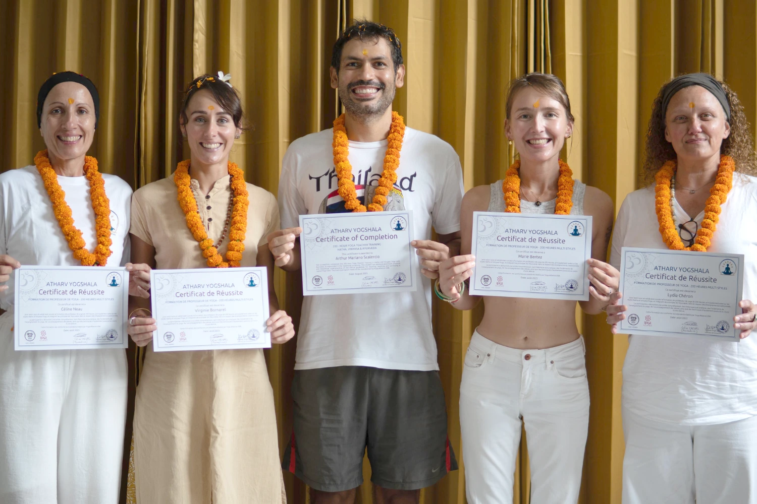 Himalayan Yoga TTC students with certificates after hiking adventure