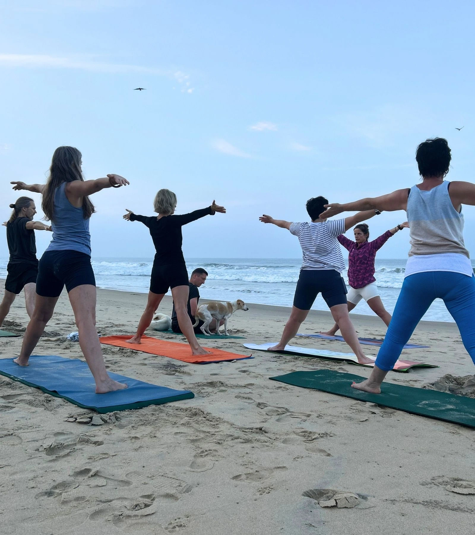 Beach yoga session in Kerala