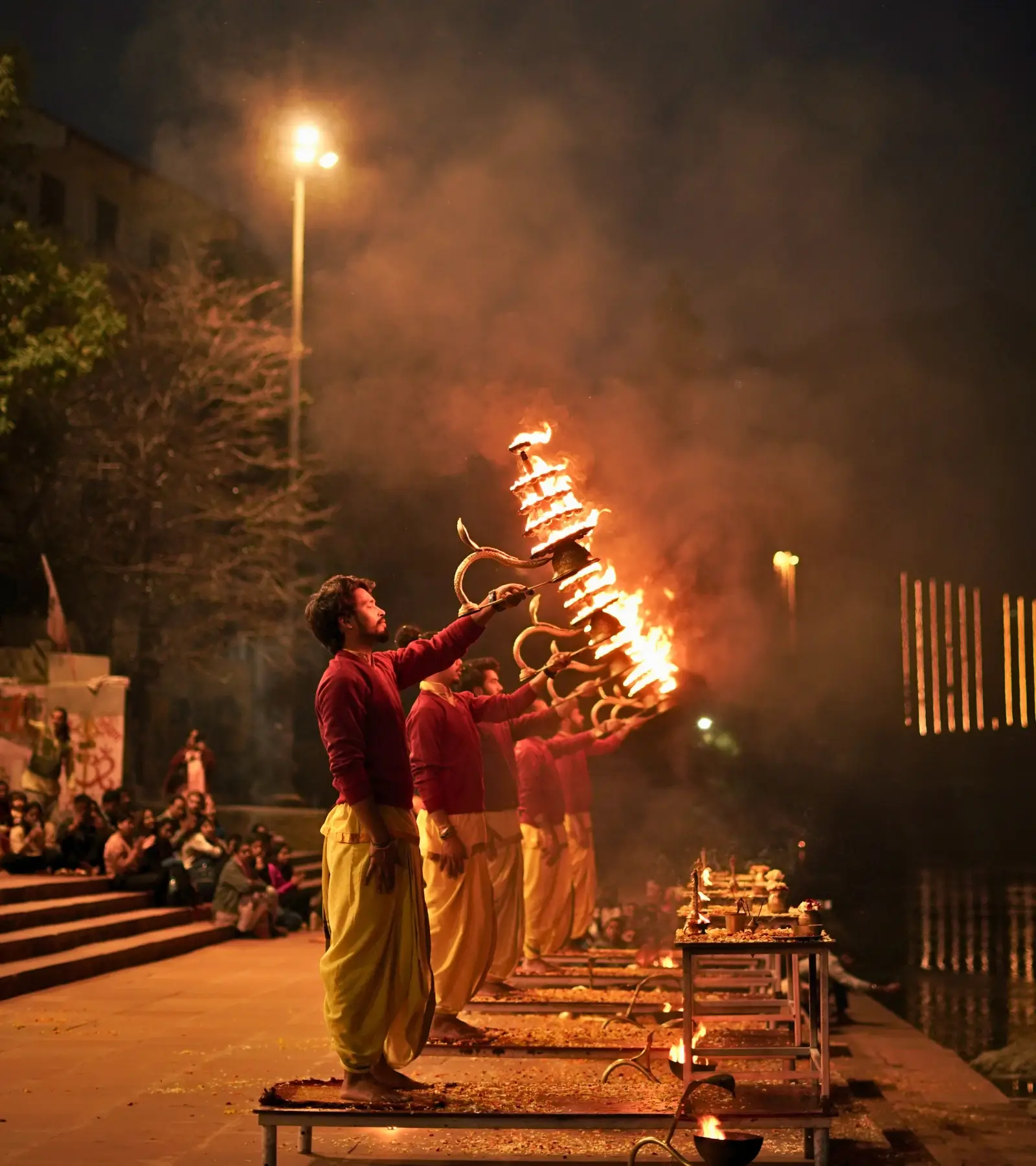 Evening Ganga Aarti ceremony in Rishikesh with lamps and devotees